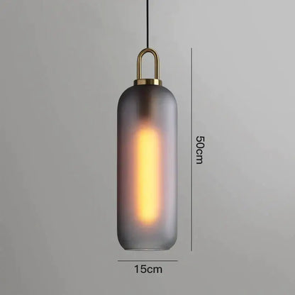 A sleek 50cm gray glass ball pendant light with frosted glass and brass accents for modern dining room decorbites pendant lights