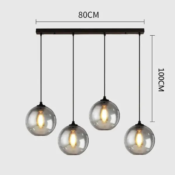 Modern black metal pendant light with four spherical gray glass pendant shades for dining room lighting