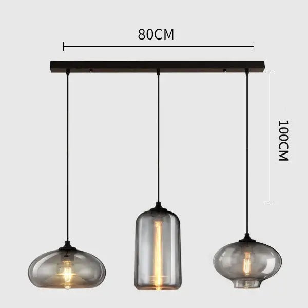 Modern gray glass pendant light set of 4 with smoked glass shades and black metal hardware for dining room lighting