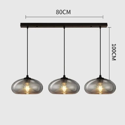Modern gray glass pendant light set of 4 with smoked glass shades and black metal frame for dining room lighting