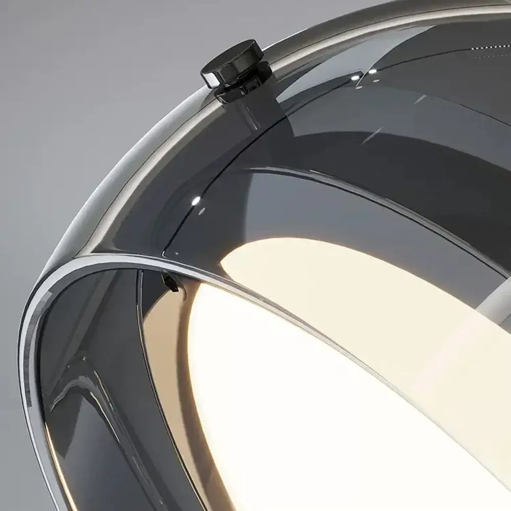 Modern gray glass pendant light with chrome plated detailing and frosted diffuser for kitchen lighting
