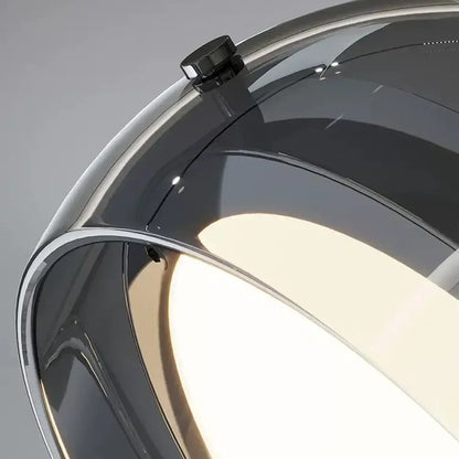 Modern gray glass pendant light with chrome plated detailing and frosted diffuser for kitchen lighting