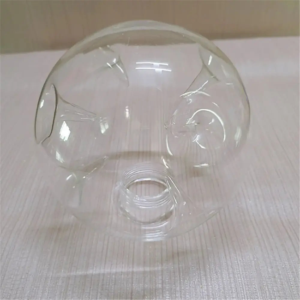 Clear plastic bottle with rounded bulbous body resembling facial features for modern gray glass shade replacement