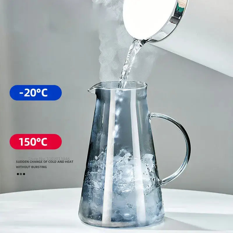 Modern gray glass water pitcher with sleek design sturdy handle and stainless steel lid for kitchen use