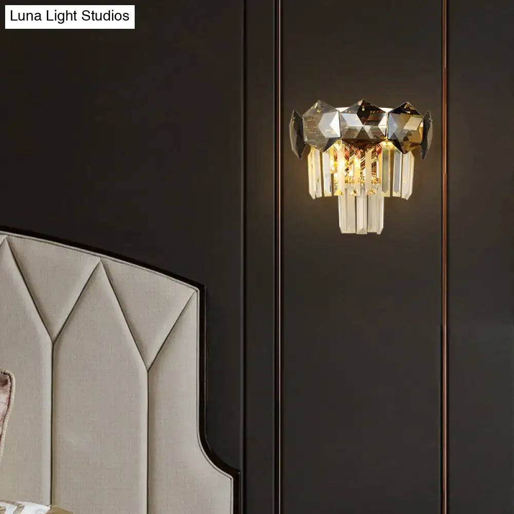 Modern gray and gold faceted crystal wall light fixture with geometric top and cascading prisms for restaurants wall lamp