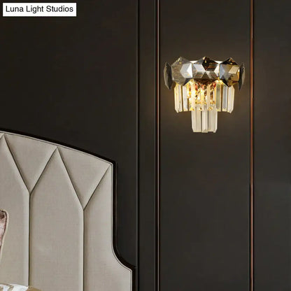Modern gray and gold faceted crystal wall light fixture with geometric top and cascading prisms for restaurants wall lamp