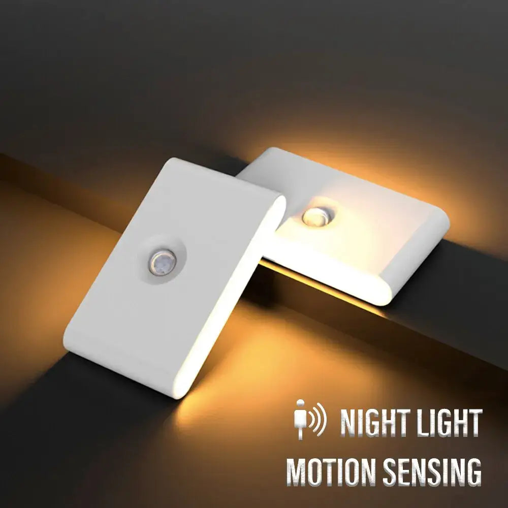 Modern gray induction night light wall lamp with white rectangular motion sensor and smooth plastic finish decorbites induction night