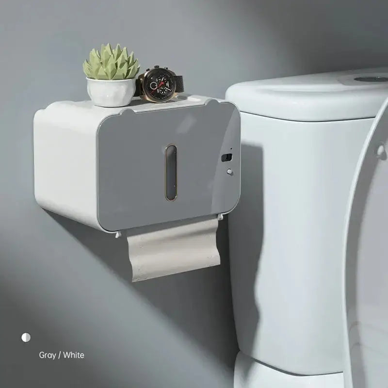 Modern gray induction toilet paper holder with sleek wall-mounted design for bathroom paper holder and shelf use