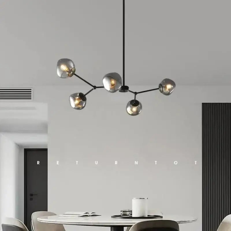 Modern black metal chandelier with five spherical gray lava glass shades for dining room LED pendant light