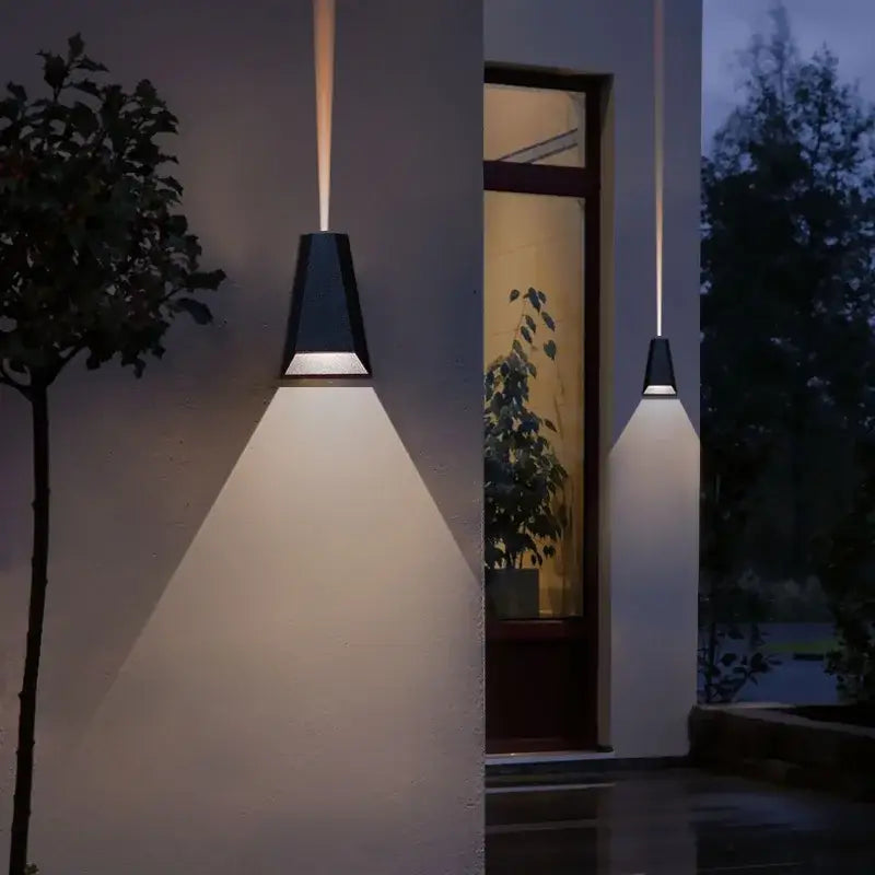 Modern gray led wall washer outdoor sconce with black conical design casting warm light for garden and villa decorbites led wall