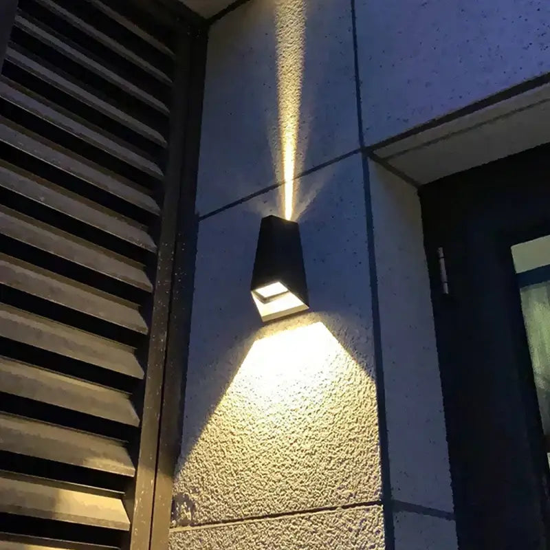 Black angular modern gray led wall washer outdoor sconce emitting warm white light for garden and villa decorbites led wall