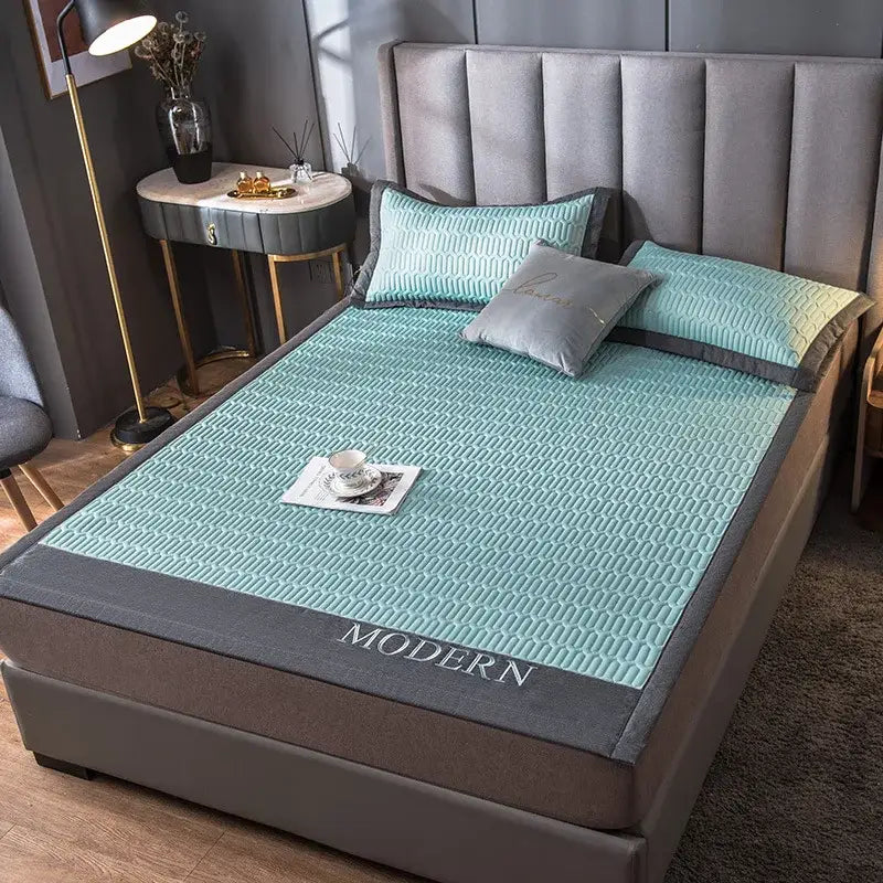 Modern light blue quilted cooling latex bed mat with dark gray border and embroidered modern for bedroom use