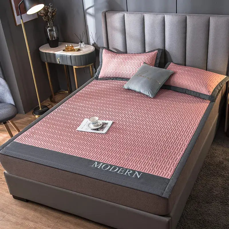Pink quilted cooling latex bed mat with gray border and modern embroidery for bedroom use