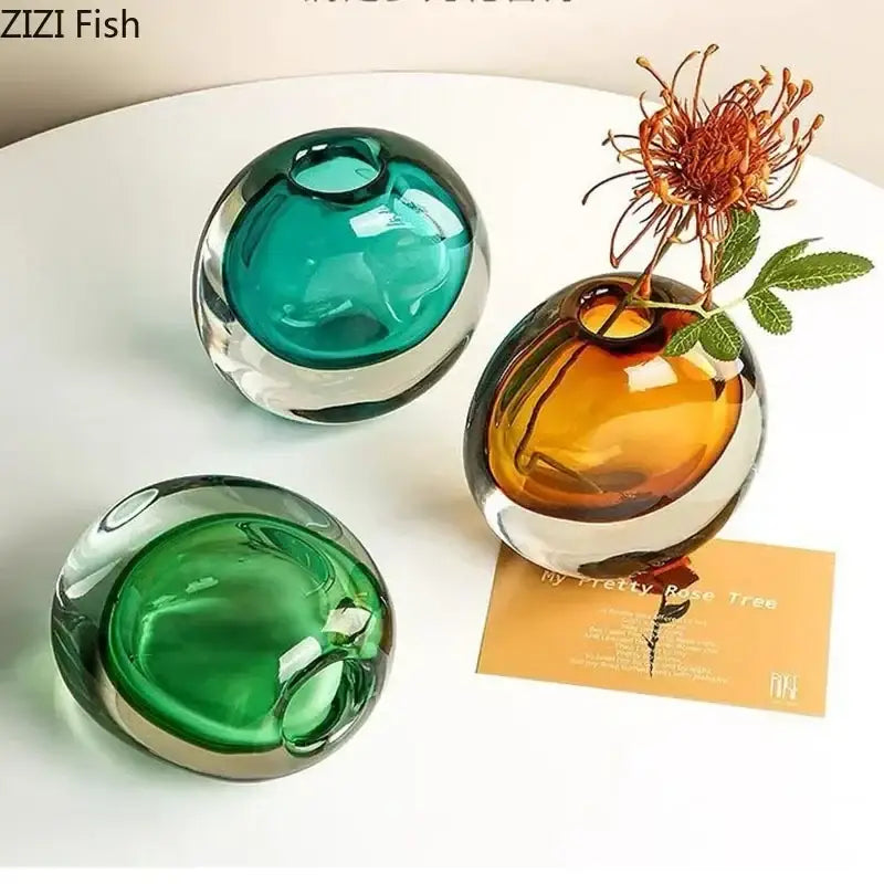 Modern gray and teal glass vase set with artificial flowers featuring teal amber and green spherical vases for home decor