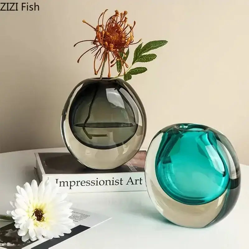 Modern gray and teal glass vase set with smooth curves featuring artificial flowers for elegant home decor