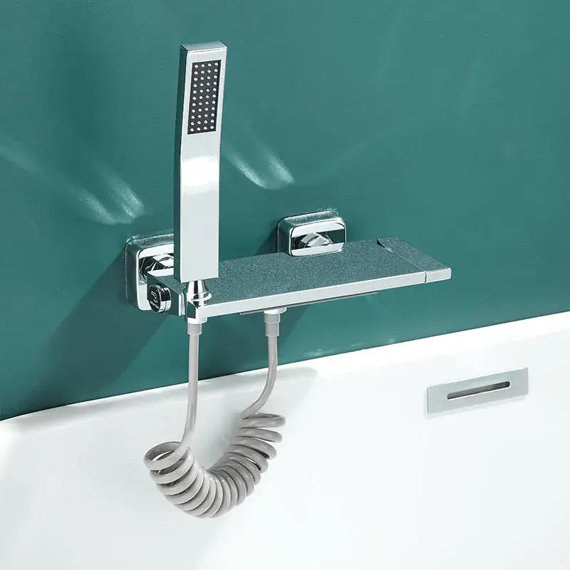 Modern gray wall mounted faucet set featuring a chrome-finished bathtub shower fixture with a sleek handheld spray and shelf