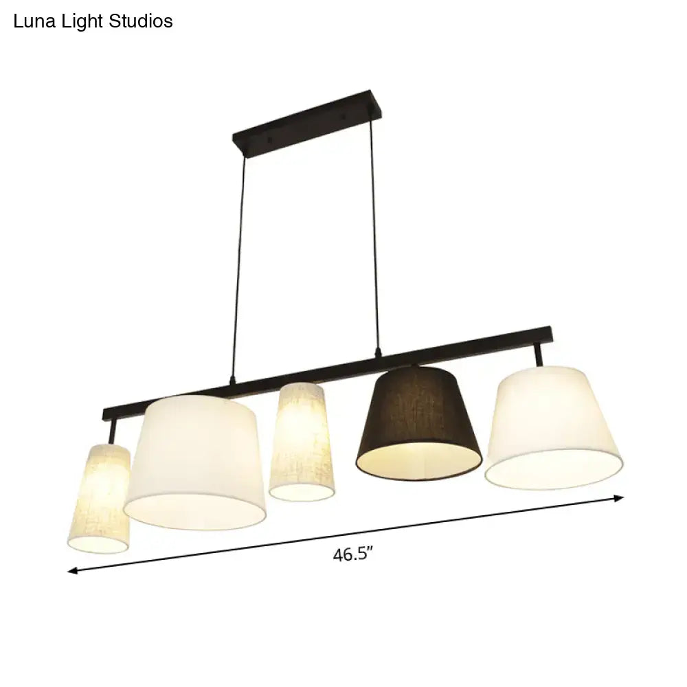 Decorbites™ barrel hanging light kit with five black metal fabric shades in off-white and dark brown for island lighting