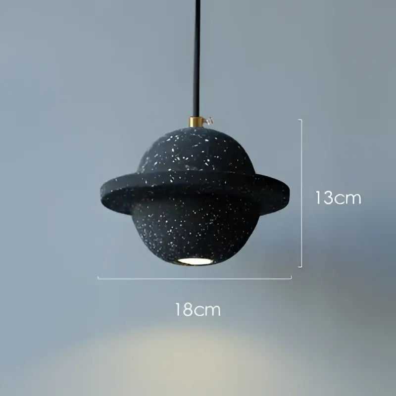 Modern gray and white decorbites cement planet pendant light with black speckled planet shape and gold suspension ring