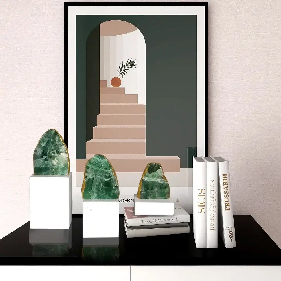 Modern green agate crystal stone bookends featuring polished green agate with golden edges on white bases for decor