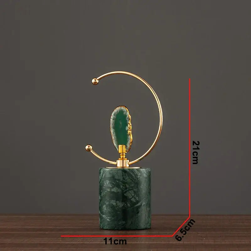Modern green and gold agate crafts marble base art featuring a green marble base and gold crescent arch with geode slice