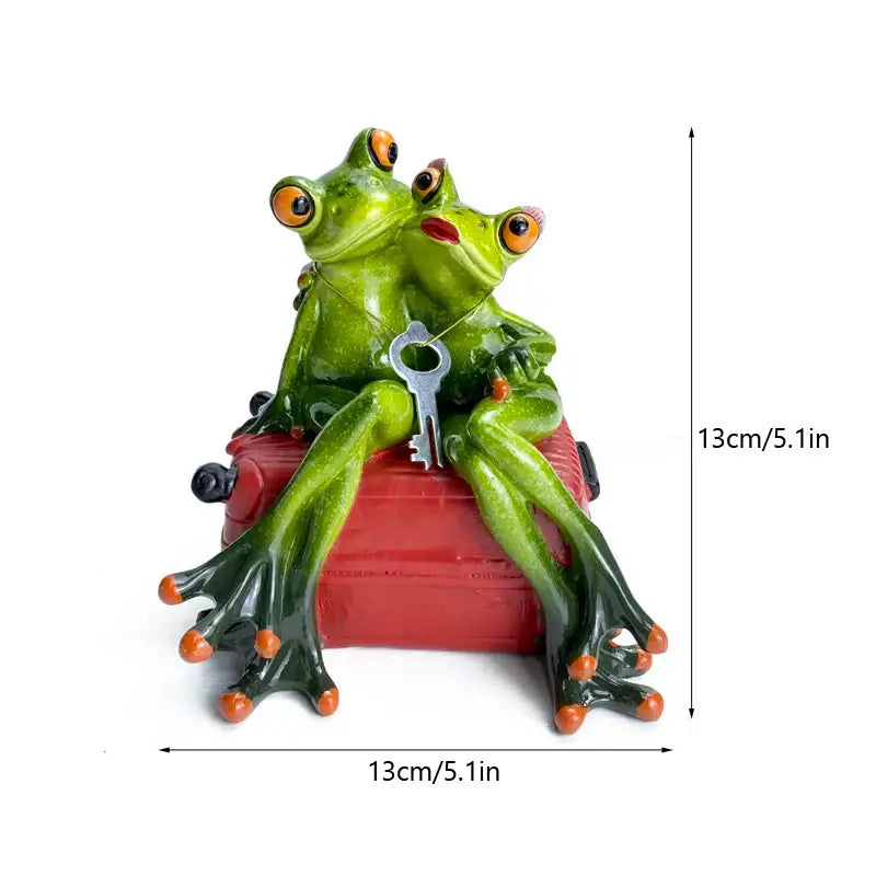 Modern green and orange leggy frog couple figurine with vibrant resin and silver key for living room decorbites decor