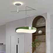 Modern green curved pendant light chandelier with sleek design and metallic arm for dining room lighting