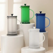 Modern green glass french press coffee maker with matching lid and handle ideal for decorbites french press use