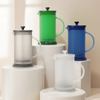 Modern green glass french press coffee maker with matching lid and handle ideal for decorbites french press use