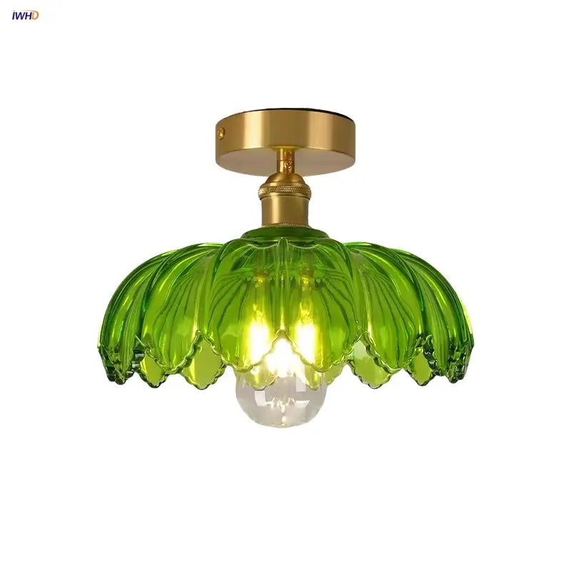 Modern green glass leaf flush mounted ceiling light with brass fixture and clear bulb for bedroom ceiling light