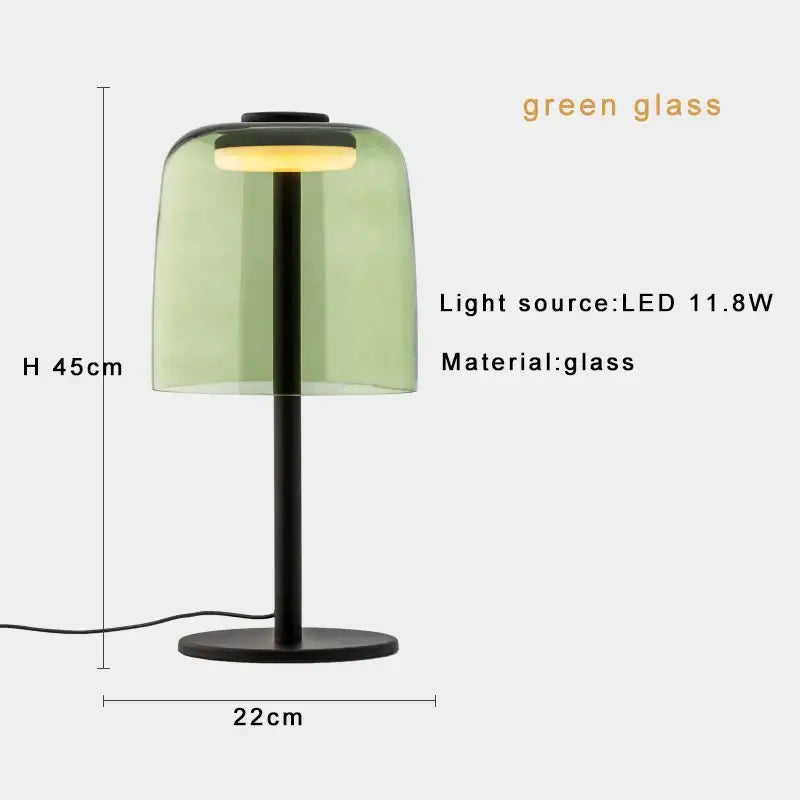 Modern green glass table lamp with translucent dome, black metal base, and led bulb for bedroom use