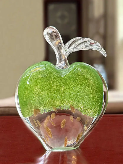 Translucent green crystal glass apple paperweight with gold speckles and clear stem for modern office decorbites crystal glass decor