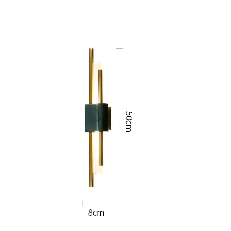 Modern minimalist wall lamp with two slender gold rods intersecting a dark green marble accent for decorbites light luxury