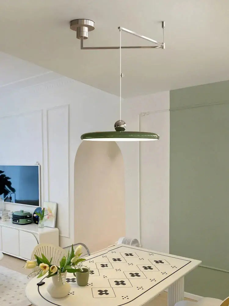 A sleek modern pendant light with matte green shade and polished chrome hardware for kitchen decorbites colorful metal led lighting