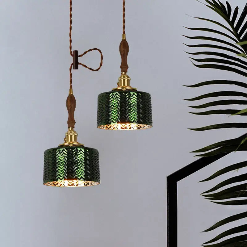 Modern green wave glass pendant light featuring green ceramic with herringbone pattern and brass accents for decorbites pendant light decor