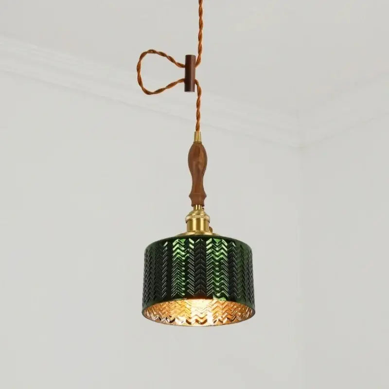 Modern green wave glass pendant light with dark green ceramic textured chevron pattern and brass accents for living room decorbites green wave