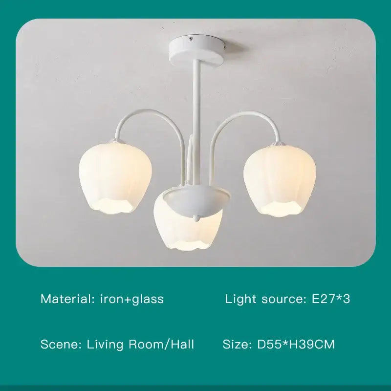 Modern green white chandelier featuring a white iron and glass chandelier with three tulip-shaped lampshades for ceilings