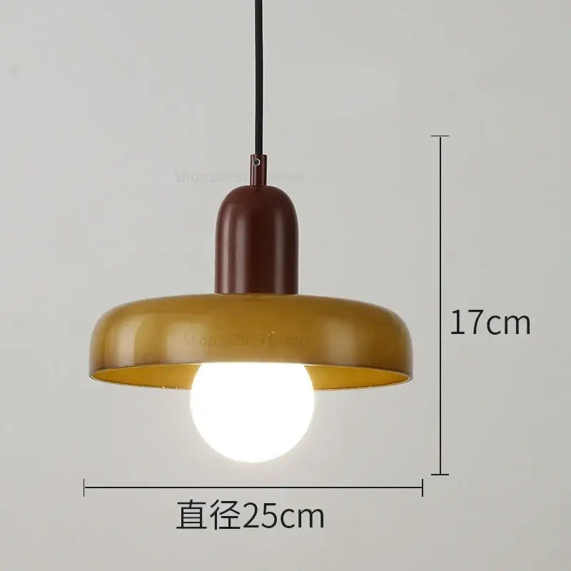 Modern pendant lights with warm amber glass shade and matte brown metal fixture from decorbites colorful glass pendant collection