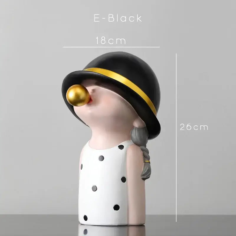 Modern green and white polka dot bubble gum blowing statue with black hat gold trim and pink skin-toned figure