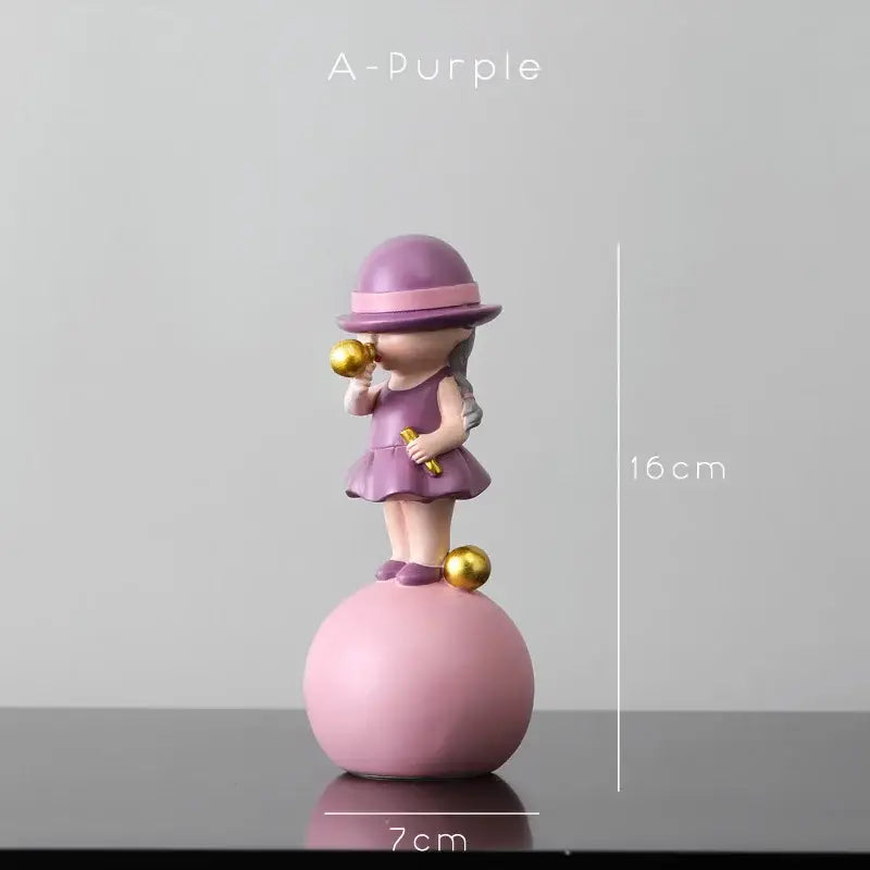 Modern green and white polka dot bubble gum blowing statue featuring a purple resin girl holding golden spheres for living room decor