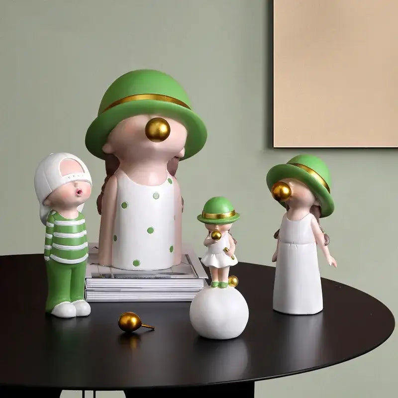 Modern green and white polka dot bubble gum blowing statue with gold nose ornaments for living room décor