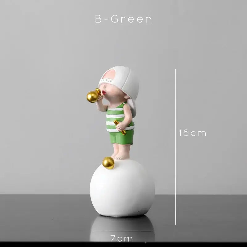 A modern green and white polka dot bubble gum blowing resin statue of a child holding golden objects for living room decor