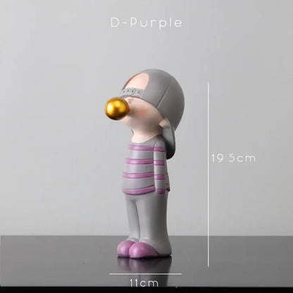 Modern green and white polka dot bubble gum blowing statue in gray and purple stripes with gold bubble for living room decor