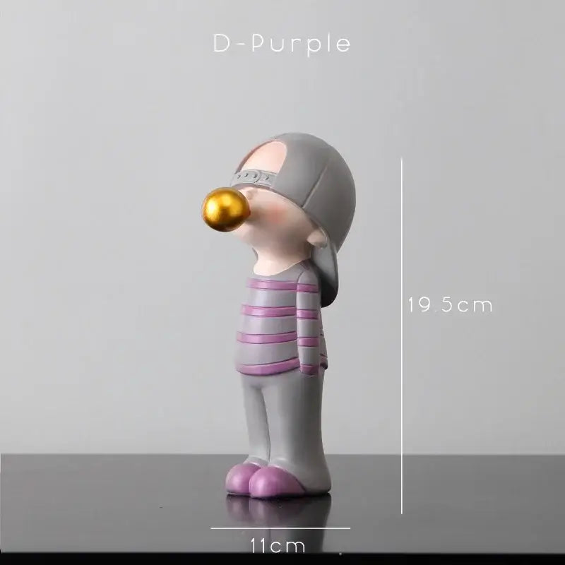 Modern green and white polka dot bubble gum blowing statue in gray and purple stripes with gold bubble for living room decor