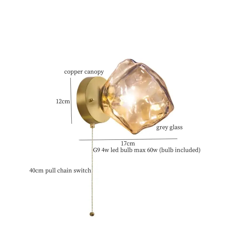 A modern grey glass led wall lamp featuring a copper canopy and irregular grey glass shade with 40cm pull chain switch