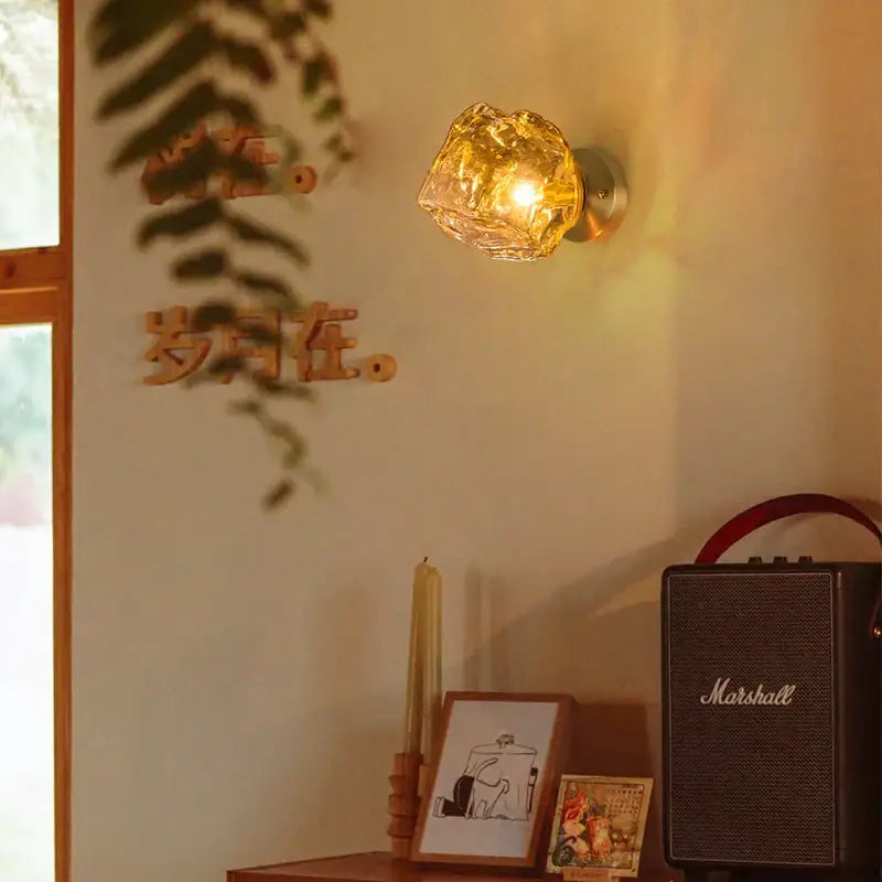 Modern grey glass led wall lamp with golden textured glass sconce and warm glow for stylish bedroom decorbites grey glass
