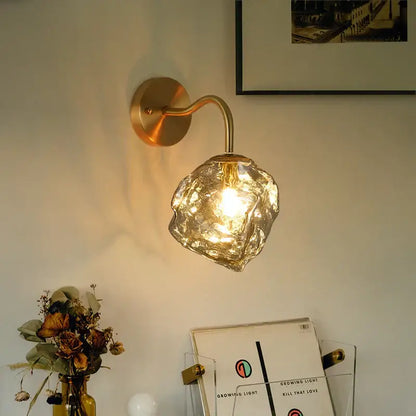 Gold-toned wall lamp with decorbites grey glass textured faceted shade modern grey glass led crystal sconce