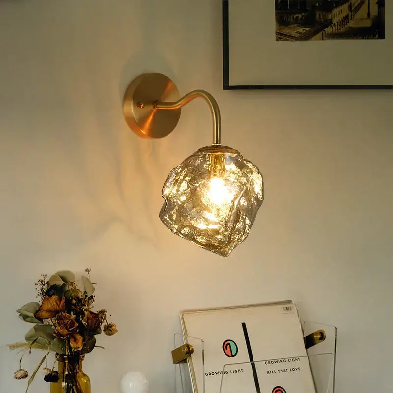 Gold-toned wall lamp with decorbites grey glass textured faceted shade modern grey glass led crystal sconce