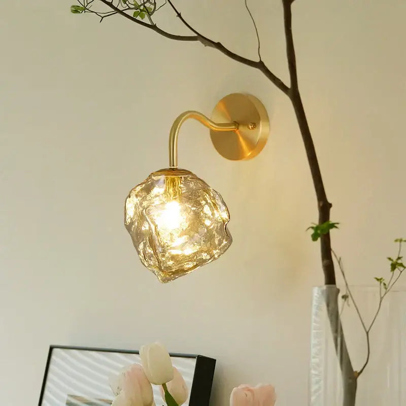 Modern grey glass led wall lamp with gold-toned crystal sconce and textured amber-hued glass globe for bedroom decorbites gray glass