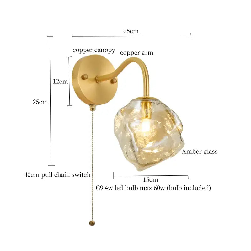 A warm amber glass wall lamp with copper canopy and arm complements decorbites grey glass led sconce design