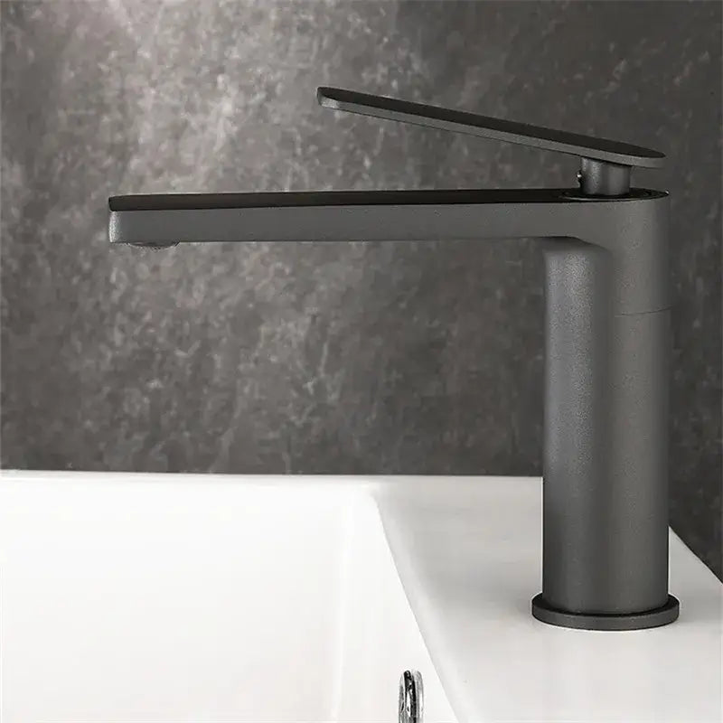 Modern gun gray basin faucet with matte black finish and tall cylindrical base for bathroom sink decorbites gun gray design